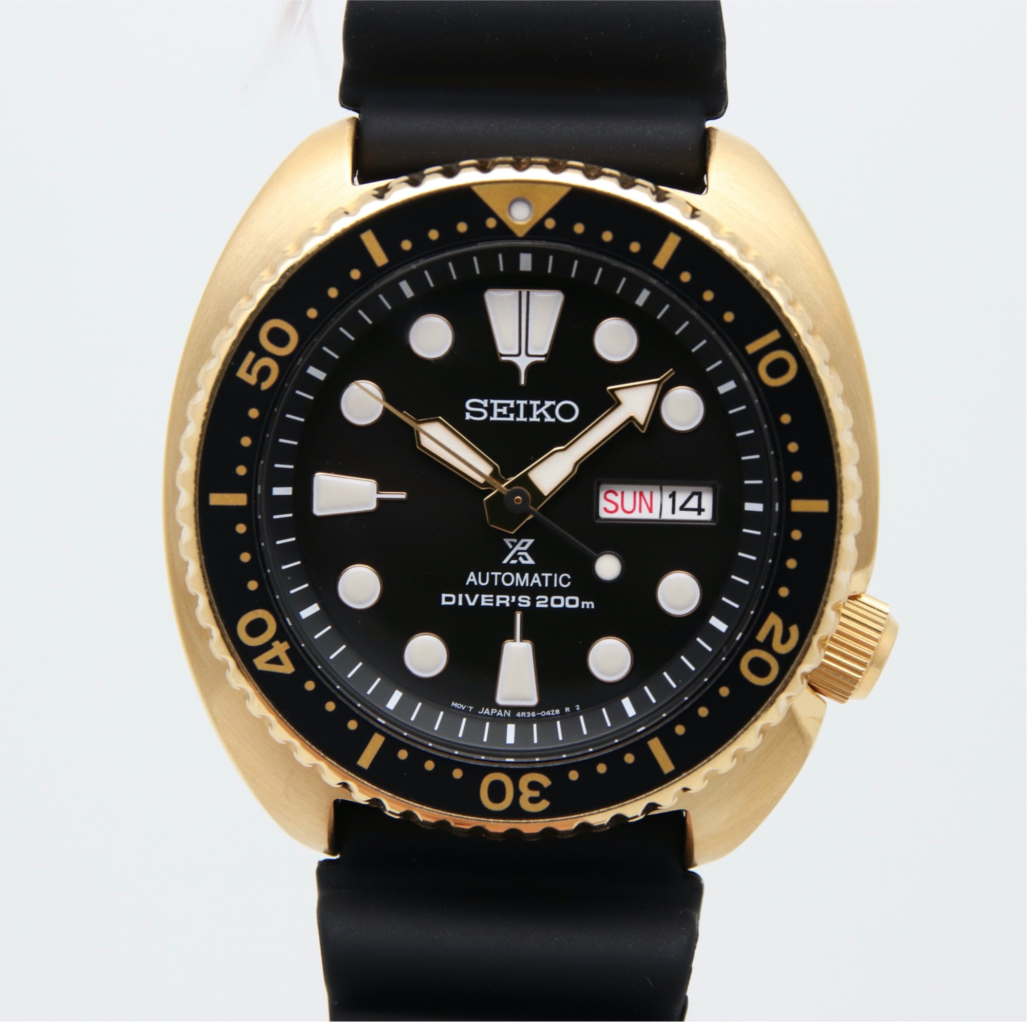 Seiko turtle hotsell black and gold